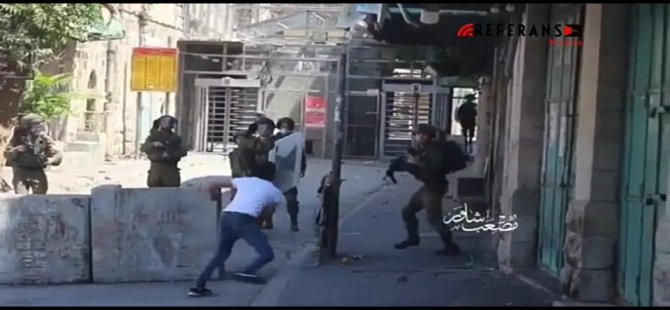 Tek kişilik ordu: Filistinli genç onlarca İsrail askerine taş ve sopayla direndi (Video Haber)