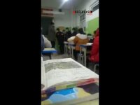 Çinli öğretmen Uygur öğrenciyi sınıfın ortasında acımasızca dövdü (Video Haber)